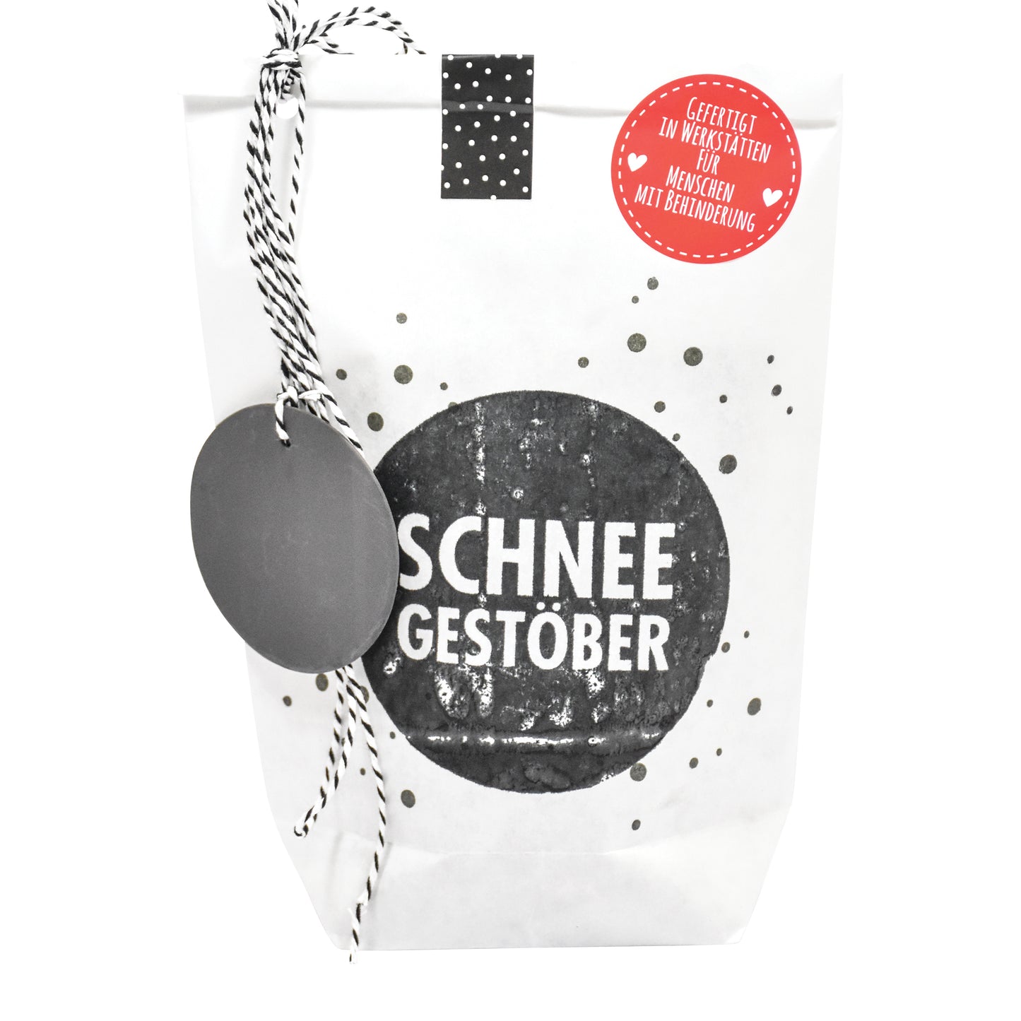 Wundertüte in weiß bestempelt mit Schneegestöber als winter geschenke