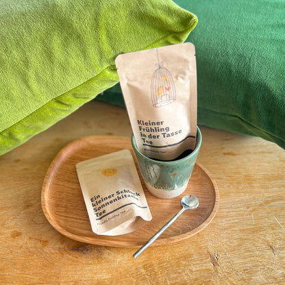 Ein kleiner Schluck Sonnenkitzeln Tee als Gute Laune Geschenk