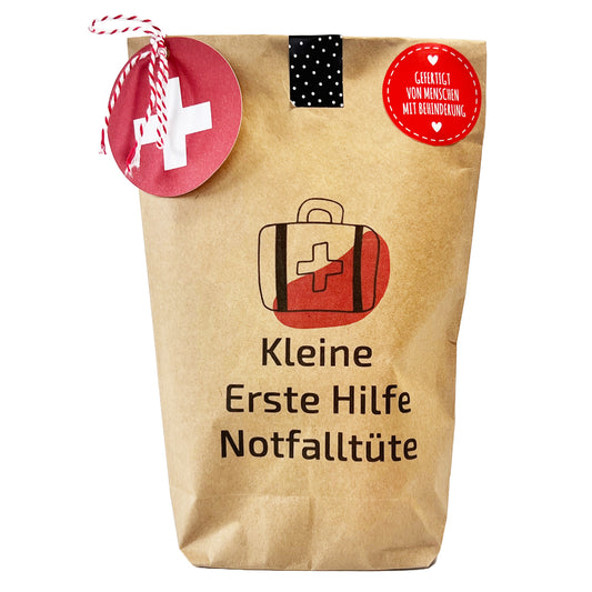 Kleine Erste Hilfe Notfall Tüte mit Erste Hilfe Utensilien